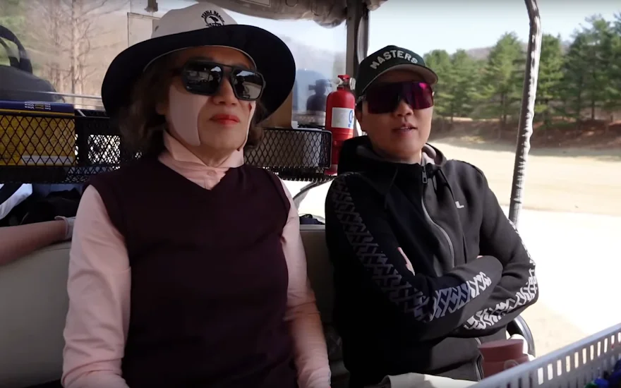 Jeongeun Lee5 and her mom share a lighthearted moment while golfing together.